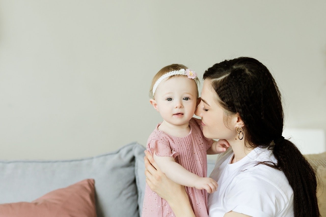 mother and daughter embracing 