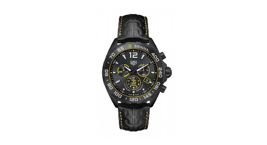 a sporty deep gray watch with yellow details and a chronograph