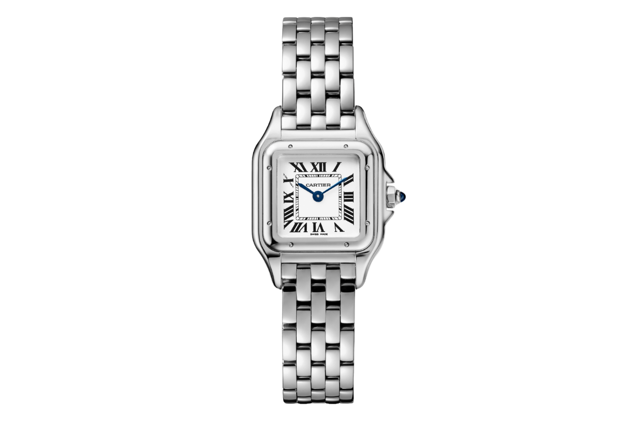 Cartier Santos watch with a silver bezel and bright white dial with roman numerals.