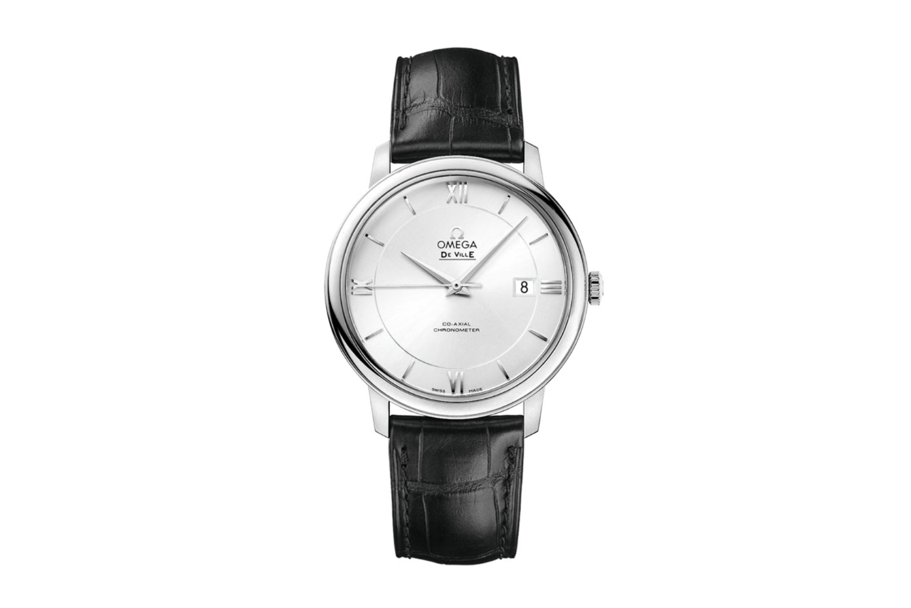Omega watch with a black leather strap, a silver bezel, and a pearl dial.