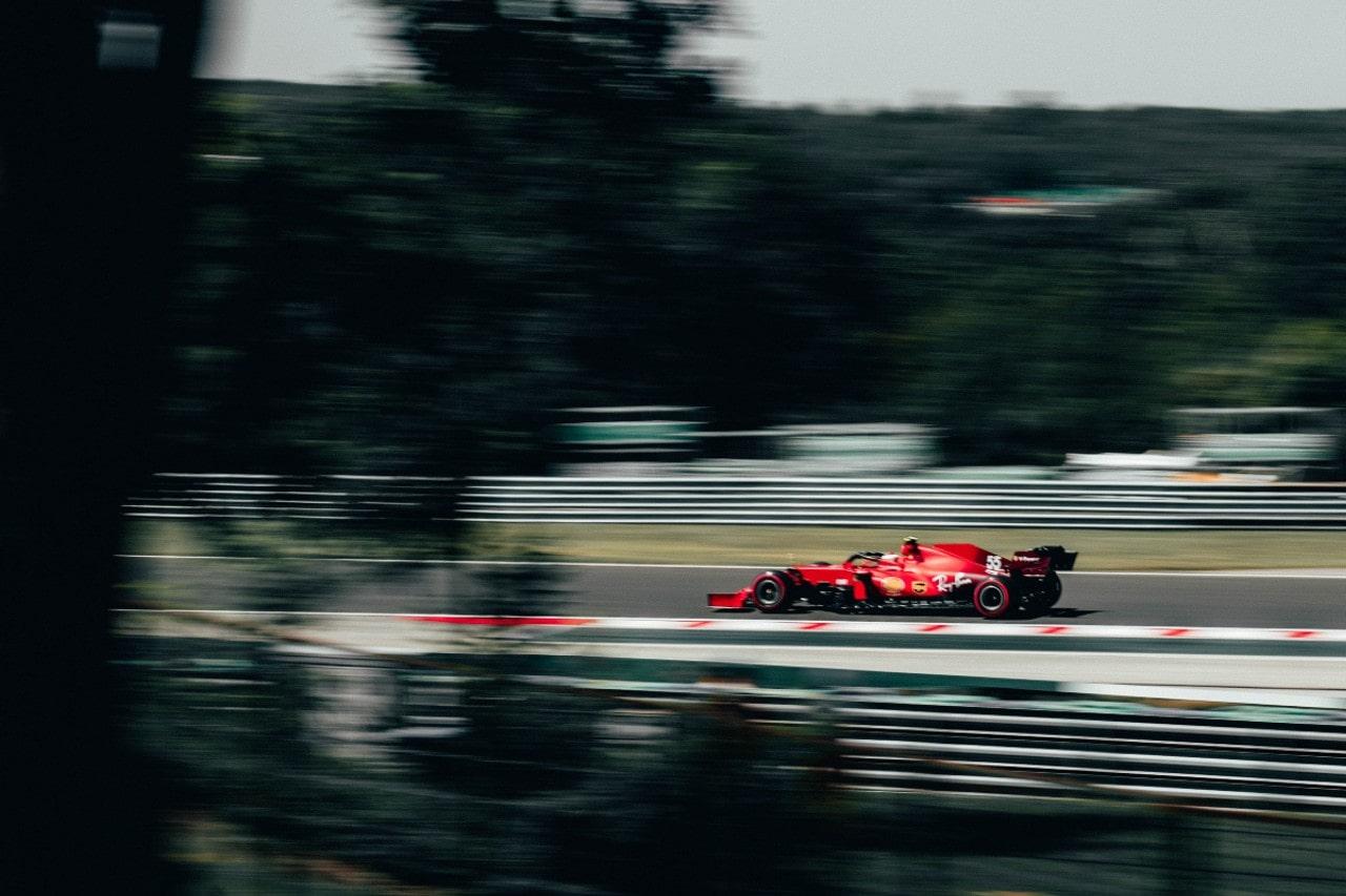 a Formula 1 car driving on a track