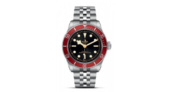a sterling steel and red watch with black dial from TUDOR’s Black Bay collection