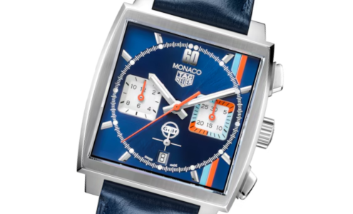 A close-up of a TAG Heuer Monaco watch with a striking blue dial and square case, available at Horologio presented by LV Luxury Jewelers.