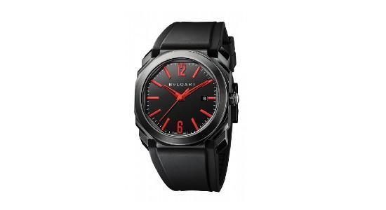 a black Bvlgari watch with red hands and indices